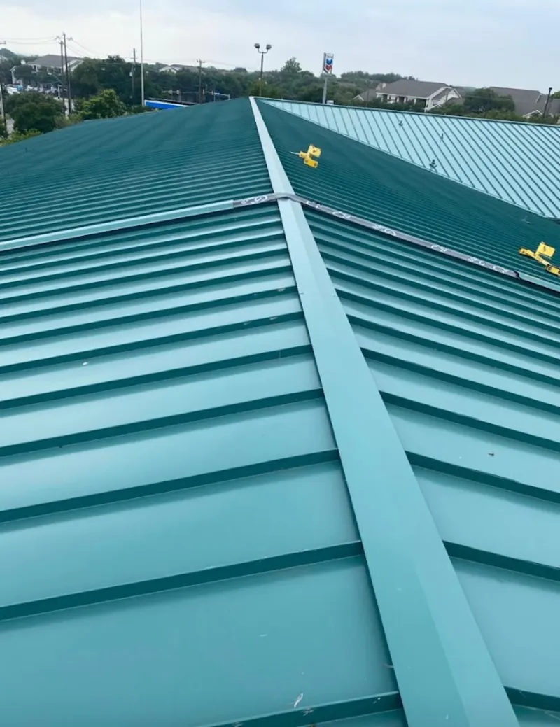 Green commercial metal roof ridge and valley for Metal Roof Repair in Magalia